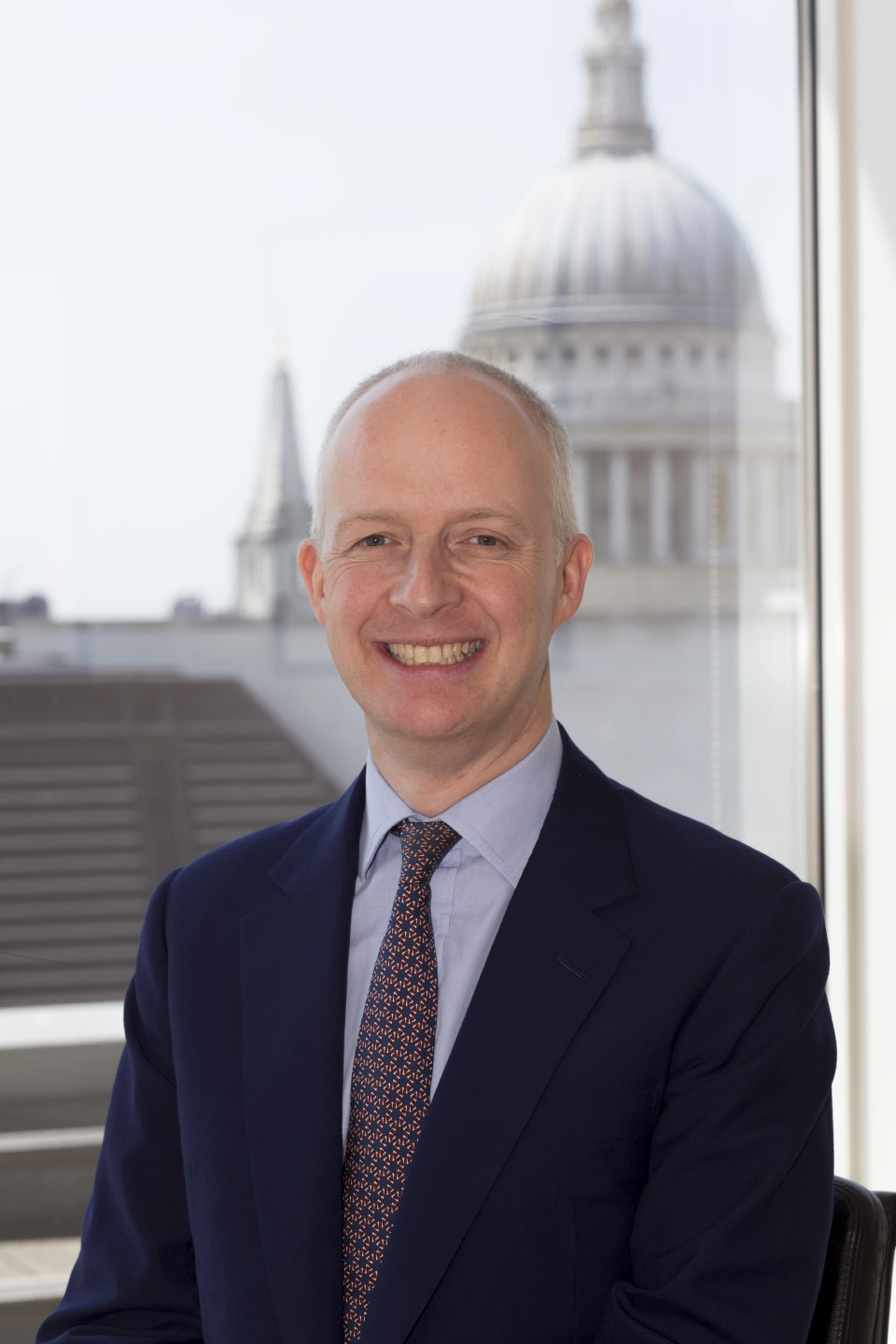 นายเดวิด ดอเคอร์ตี้ ผู้อำนวยการฝ่ายการลงทุนแบบ Thematics, Schroders