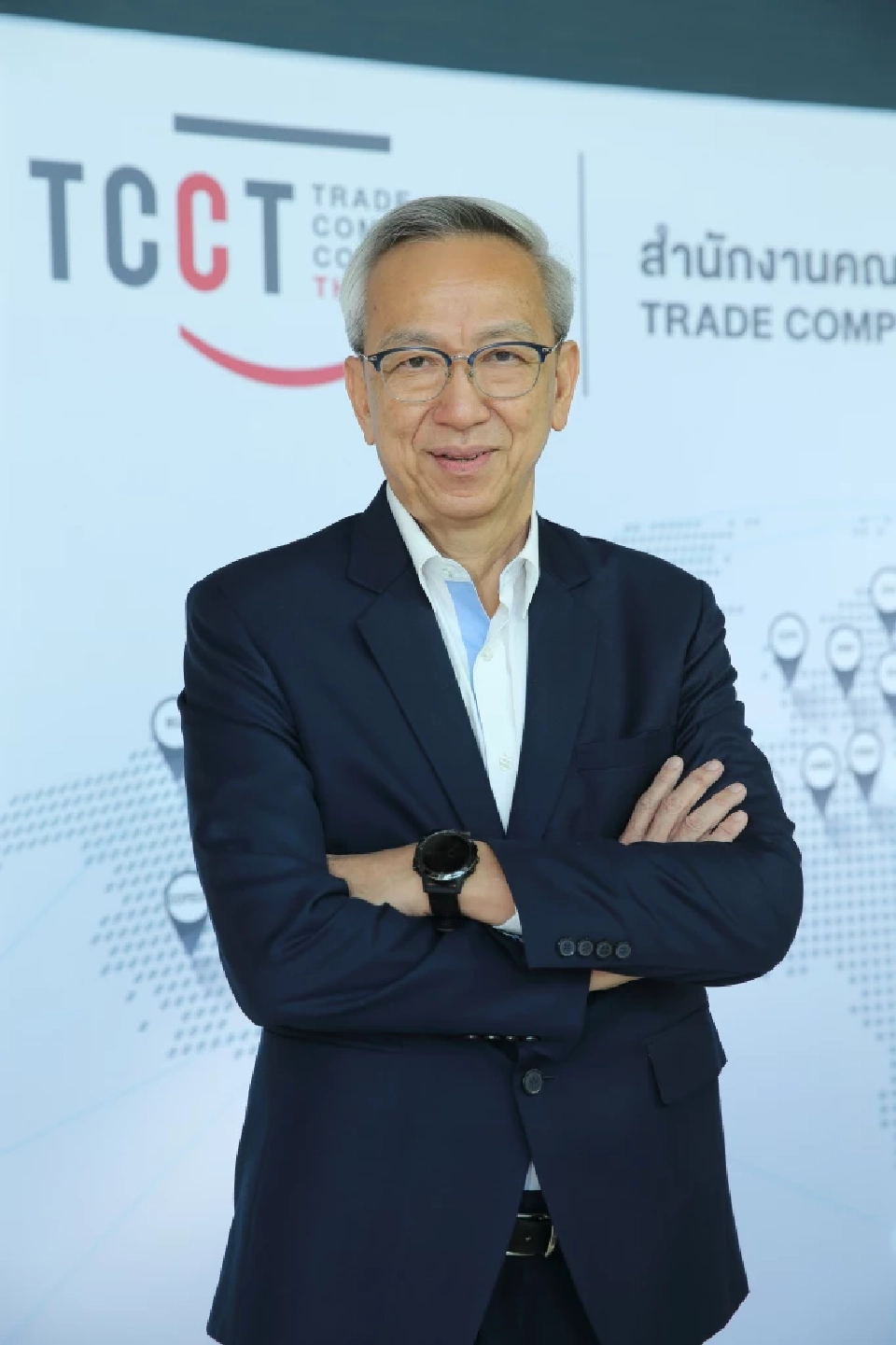 นายสกนธ์ วรัญญูวัฒนา ประธานกรรมการการแข่งขันทางการค้า 